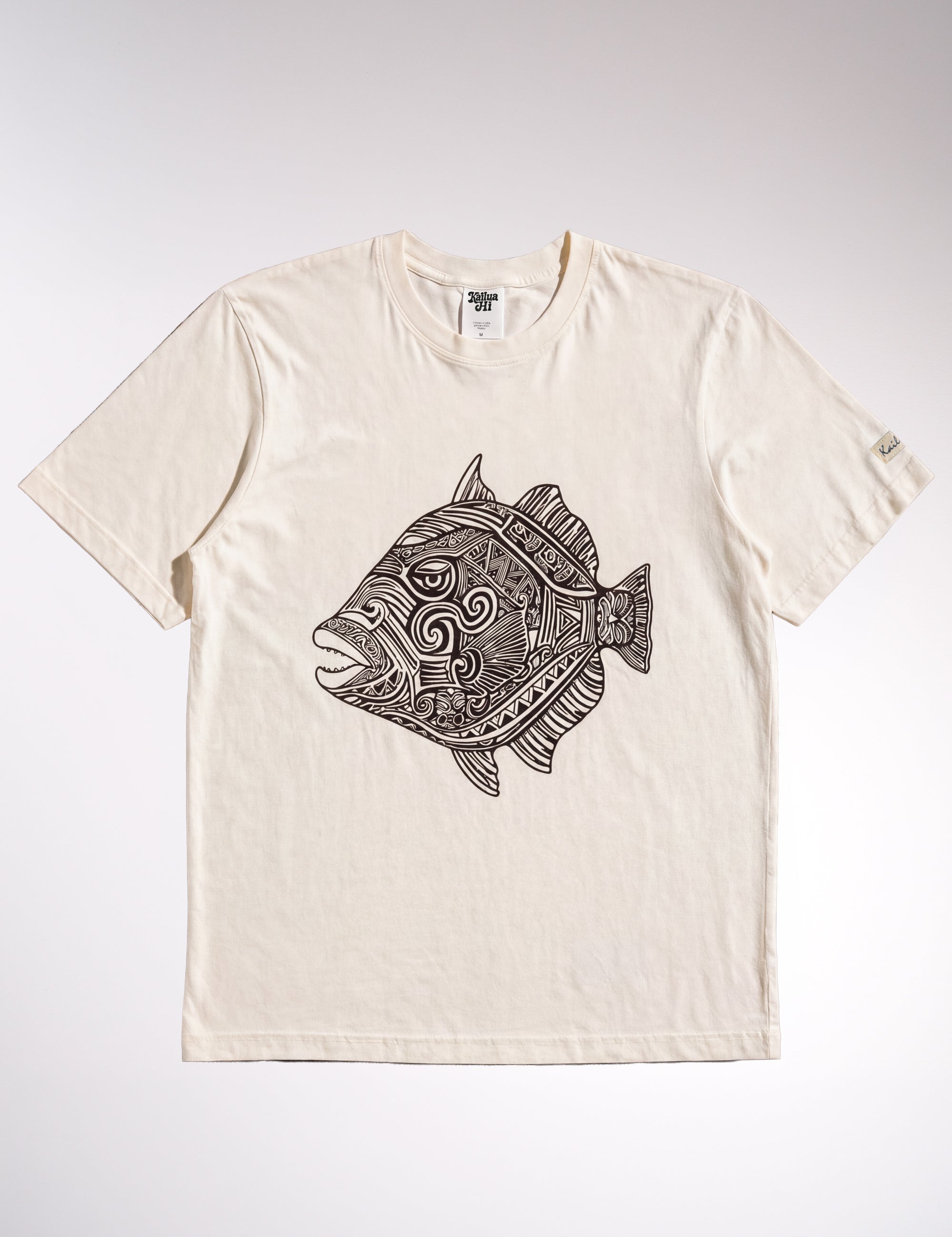 natural color t-shirt with a dark brown fish graphic on a white background