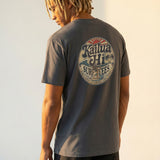 Person wearing a kailua hi vintage logo gray t-shirt with a logo on the back, standing against a plain background