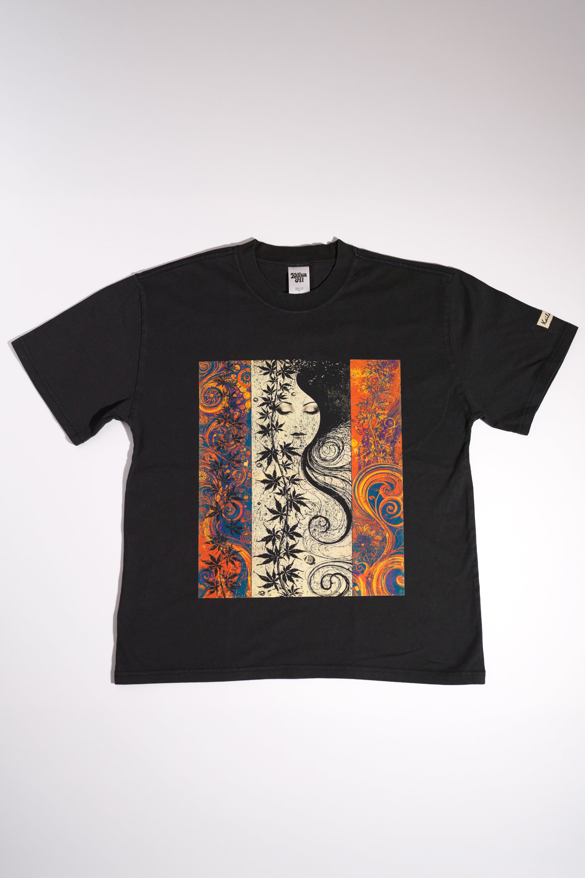 Black t-shirt with a colorful abstract design on a white background