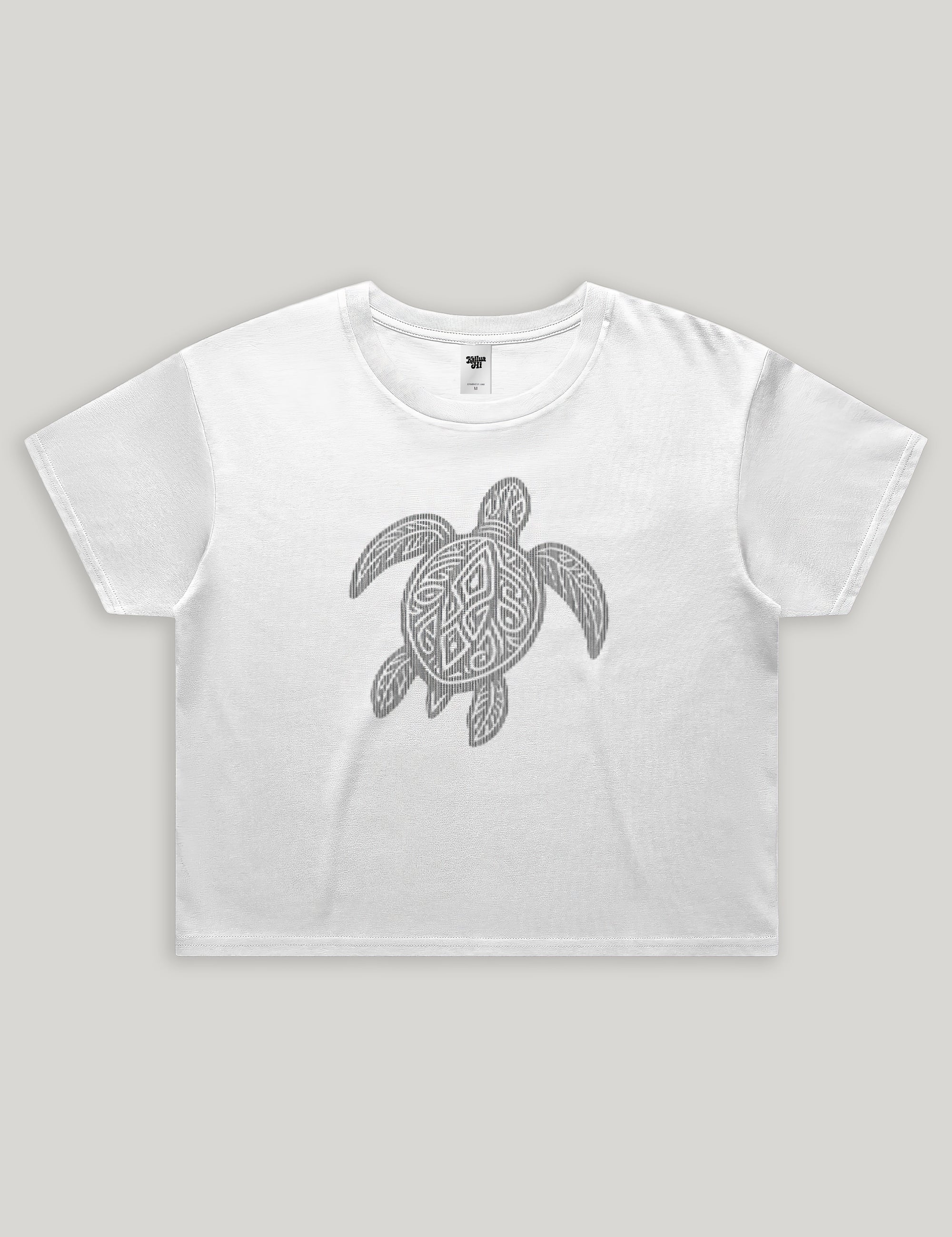 White t-shirt with a turtle design on a gray background