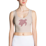 front view of light-rose, body-hugging crop top with centered burgundy honu turtle motif