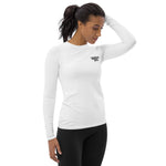 front view of white women’s rash guard with small logo mark on chest, long sleeves, fitted silhouette