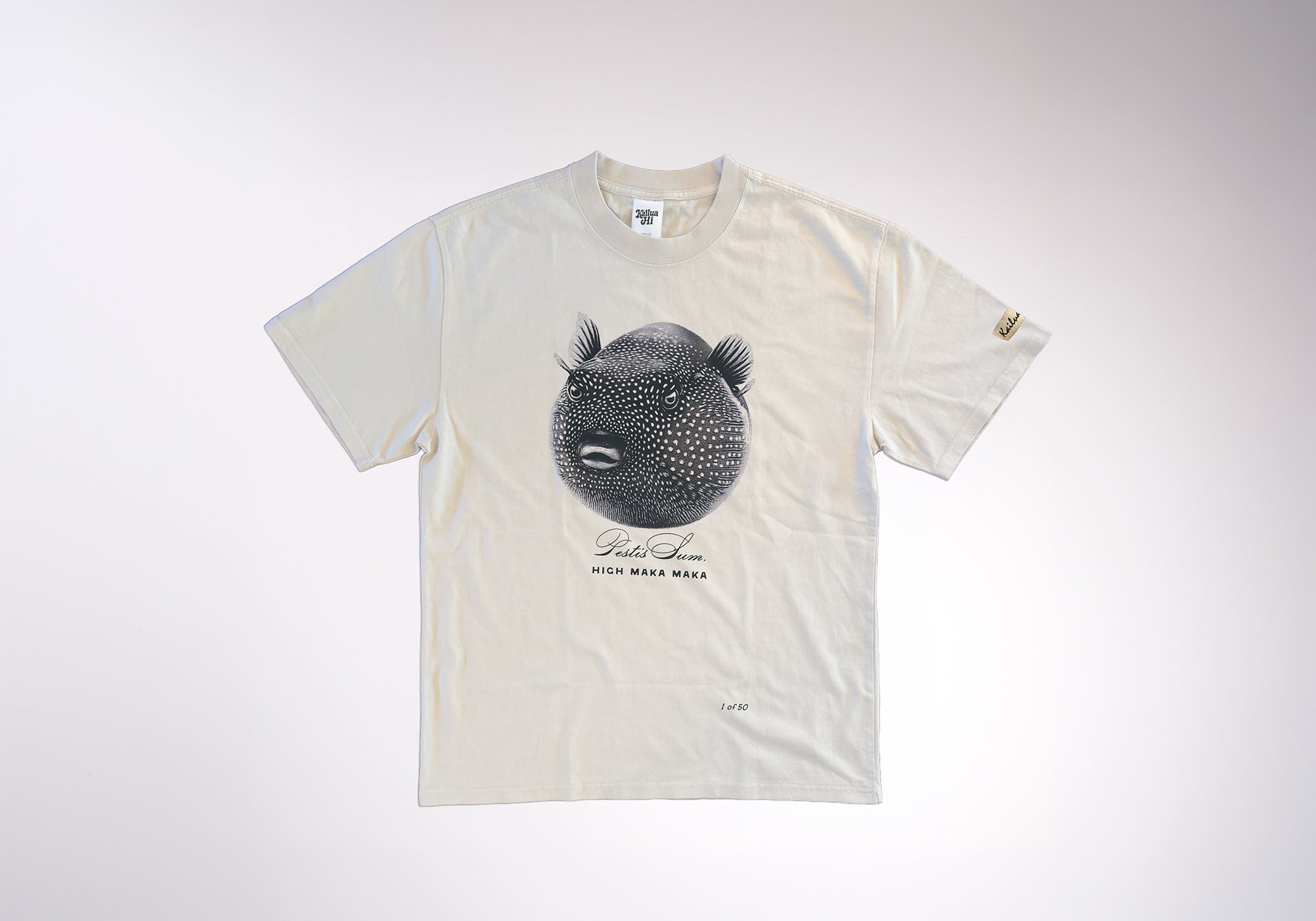 Beige t-shirt with a graphic design of a pufferfish on a white background