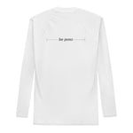 back view flat lay of white men’s rash guard showing centered “be pono” line graphic across the shoulders